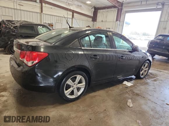 ✅ 2014 Chevrolet Cruze 2LT • VIN: 1G1PE5SB2E7398914 • Lot: 86634495. Listed on Copart with 173,118 mi. Free auction sales archive from the USA and detailed vehicle history report at DreamBid. Image 3.
