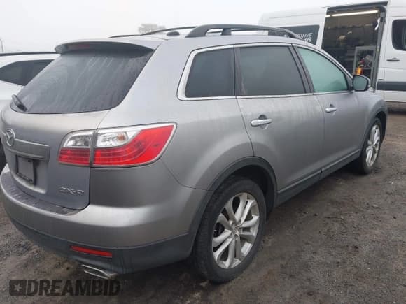 ✅ 2011 Mazda CX-9 Grand Touring • VIN: JM3TB3DA8B0312069 • Lot: 41793398. Listed on IAAI with 185,381 mi. Free auction sales archive from the USA and detailed vehicle history report at DreamBid. Image 4.