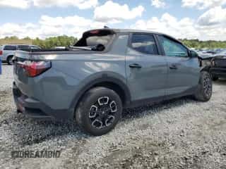 2022 Hyundai Santa Cruz SEL z VIN 5NTJB4AE4NH007271, wystawiony jako Copart lot #65766224 z przebiegiem 37 455 mil mil oraz Szkoda całkowita • Salvage title. Historia ofert i sprzedaży dostępna na DreamBid. Obrazek 3.