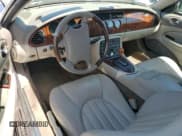 ✅ 1999 Jaguar XK • VIN: SAJGX204XXC034367 • Lot: 58468455. Wystawiony na Copart z przebiegiem 36 246 mil. Bezpłatny archiwum sprzedaży aukcyjnych z USA i szczegółowy raport historii pojazdu na DreamBid. Zdjęcie 8.