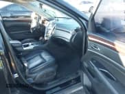 ✅ 2015 Cadillac SRX Luxury Collection • VIN: 3GYFNEE38FS595607 • Lot: 43720579. Listed on IAAI with 103,582 mi. Free auction sales archive from the USA and detailed vehicle history report at DreamBid. Image 5.