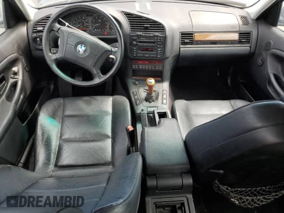 1998 BMW 3 Series z VIN WBACD3321WAV24693, wystawiony jako Copart lot #66515794 z przebiegiem 228 492 mil mil oraz Szkoda całkowita • Salvage title. Historia ofert i sprzedaży dostępna na DreamBid. Obrazek 8.