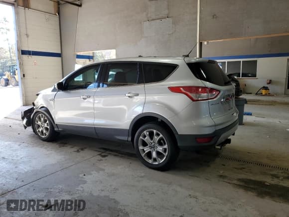 ✅ 2013 Ford Escape SEL • VIN: 1FMCU9H9XDUA25328 • Lot: 90667755. Listed on Copart with 195,150 mi. Free auction sales archive from the USA and detailed vehicle history report at DreamBid. Image 2.
