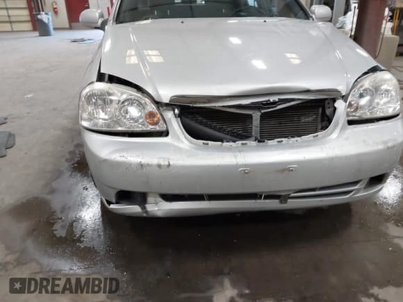 ✅ 2006 Suzuki Forenza • VIN: KL5JD86Z96K347066 • Lot: 43031924. Listed on IAAI with 65,393 mi. Free auction sales archive from the USA and detailed vehicle history report at DreamBid. Image 6.