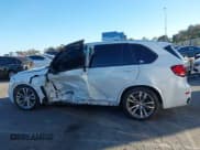 ✅ 2014 BMW X5 xDrive35i • VIN: 5UXKR0C53E0H21184 • Lot: 43520480. Listed on IAAI with 75,808 mi. Free auction sales archive from the USA and detailed vehicle history report at DreamBid. Image 13.