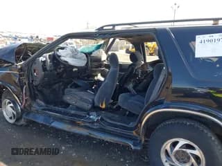 ✅ 2000 Chevrolet Blazer LT • VIN: 1GNDT13W8Y2280580 • Lot: 41901975. Wystawiony na IAAI z przebiegiem 236 736 mil. Bezpłatny archiwum sprzedaży aukcyjnych z USA i szczegółowy raport historii pojazdu na DreamBid. Zdjęcie 6.