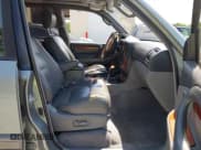 ✅ 2001 Lexus LX 470 • VIN: JTJHT00W313506322 • Lot: 42799130. Wystawiony na IAAI z przebiegiem 336 708 mil. Bezpłatny archiwum sprzedaży aukcyjnych z USA i szczegółowy raport historii pojazdu na DreamBid. Zdjęcie 5.