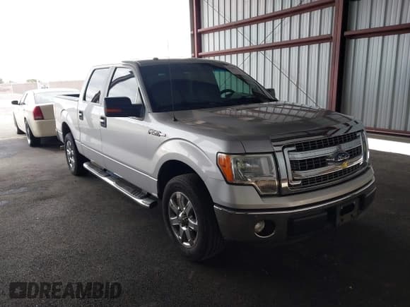 ✅ 2014 Ford F-150 XLT • VIN: 1FTFW1CF7EKD92338 • Lot: 43640970. Listed on IAAI with 140,523 mi. Free auction sales archive from the USA and detailed vehicle history report at DreamBid. Image 1.
