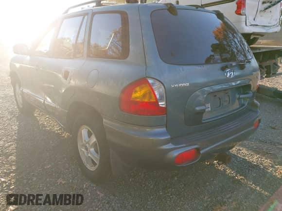2003 Hyundai Santa Fe GLS with VIN KM8SC13D83U356953, listed as a IAAI auction lot 43617810 with 183,974 mi miles and . Bid and sale history available at DreamBid. Image 3.