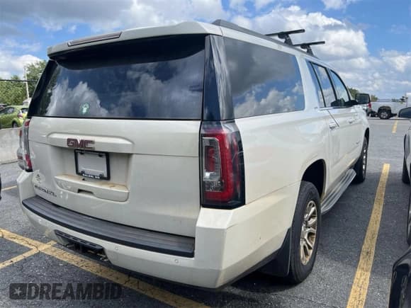 ✅ 2015 GMC Yukon XL SLT • VIN: 1GKS2HKC1FR572373 • Lot: 86259245. Listed on Copart with 141,000 mi. Free auction sales archive from the USA and detailed vehicle history report at DreamBid. Image 4.