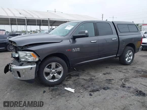 2016 Ram 1500 Big Horn with VIN 1C6RR6LM3GS233861, listed as a IAAI auction lot 41890394 with 61,637 mi miles and . Bid and sale history available at DreamBid. Image 2.