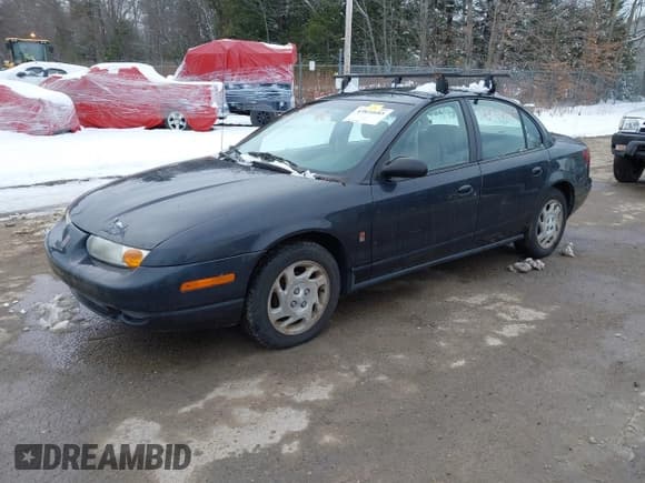 ✅ 2002 Saturn SL • VIN: 1G8ZK527X2Z197969 • Lot: 43824685. Listed on IAAI with 150,270 mi. Free auction sales archive from the USA and detailed vehicle history report at DreamBid. Image 2.