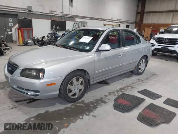 2006 Hyundai Elantra GLS with VIN KMHDN46D26U293787, listed as a IAAI auction lot 43489111 with 247,390 mi miles and . Bid and sale history available at DreamBid. Image 2.