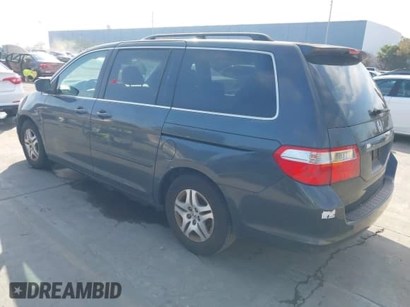 ✅ 2005 Honda Odyssey EX-L • VIN: 5FNRL386X5B412931 • Лот: 43783380. Опубликован ранее на IAAI с пробегом 142 253 миль. Бесплатный доступ к архиву аукционных продаж из США и подробный отчёт об истории автомобиля на DreamBid. Изображение 3.
