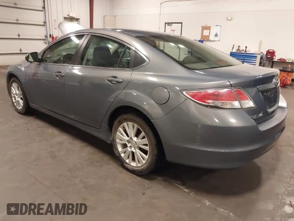 ✅ 2009 Mazda 6 i Touring • VIN: 1YVHP82A895M14379 • Lot: 42585352. Listed on IAAI with 120,532 mi. Free auction sales archive from the USA and detailed vehicle history report at DreamBid. Image 3.