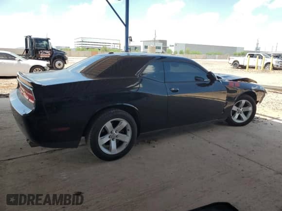 2014 Dodge Challenger Shaker with VIN 2C3CDYBT0EH299553, listed as a Copart auction lot 65808675 with 100,896 mi miles and Salvage title. Bid and sale history available at DreamBid. Image 3.