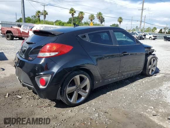 2013 Hyundai Veloster Turbo с VIN KMHTC6AE8DU178833, выставлен на аукционе Copart как лот 61944125 с пробегом 149 564 миль миль и Списание • Salvage title. История ставок и продаж доступна на DreamBid. Изображение 3.
