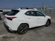 ✅ 2022 Lexus UX 250h F Sport • VIN: JTHE9JBHXN2057983 • Лот: 71456654. Опубликован ранее на Copart с пробегом 27 367 миль. Бесплатный доступ к архиву аукционных продаж из США и подробный отчёт об истории автомобиля на DreamBid. Изображение 3.
