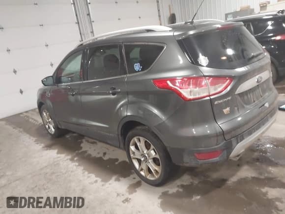✅ 2015 Ford Escape Titanium • VIN: 1FMCU9JX5FUA35888 • Lot: 41209408. Listed on IAAI with 125,378 mi. Free auction sales archive from the USA and detailed vehicle history report at DreamBid. Image 3.