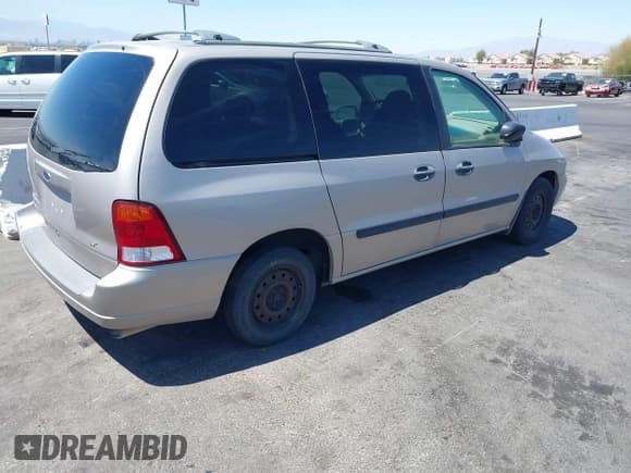 ✅ 2003 Ford Windstar LX • VIN: 2FMZA51493BA07188 • Lot: 42096389. Listed on IAAI with 119,039 mi. Free auction sales archive from the USA and detailed vehicle history report at DreamBid. Image 4.