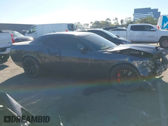 ✅ 2016 Dodge Challenger SRT Hellcat • VIN: 2C3CDZC93GH270902 • Lot: 43863546. Listed on IAAI with 33,410 mi. Free auction sales archive from the USA and detailed vehicle history report at DreamBid. Image 13.