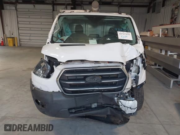 ✅ 2020 Ford Transit Cargo • VIN: 1FTBR1Y81LKA19650 • Lot: 42727232. Listed on IAAI with 103,676 mi. Free auction sales archive from the USA and detailed vehicle history report at DreamBid. Image 12.