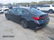 ✅ 2021 Toyota Avalon Hybrid XSE • VIN: 4T1EA1AB2MU002741 • Lot: 41865444. Wystawiony na IAAI z przebiegiem 141 196 mil. Bezpłatny archiwum sprzedaży aukcyjnych z USA i szczegółowy raport historii pojazdu na DreamBid. Zdjęcie 3.