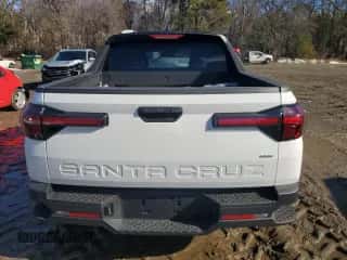 2024 Hyundai Santa Cruz SEL с VIN 5NTJBDDEXRH116593, выставлен на аукционе Copart как лот 84583164 с пробегом 15 миль миль и Списание • Salvage title. История ставок и продаж доступна на DreamBid. Изображение 6.