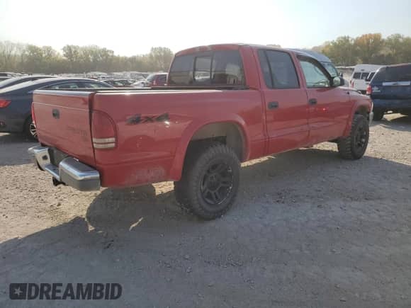 2004 Dodge Dakota SLT z VIN 1D7HG48N04S627240, wystawiony jako Copart lot #75443294 z przebiegiem 151 334 mil mil oraz Szkoda całkowita • Salvage title. Historia ofert i sprzedaży dostępna na DreamBid. Obrazek 3.