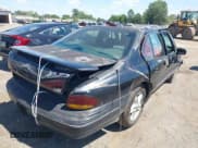 ✅ 1998 Pontiac Bonneville SE • VIN: 1G2HX52K0W4231870 • Lot: 43038855. Wystawiony na IAAI z przebiegiem 189 149 mil. Bezpłatny archiwum sprzedaży aukcyjnych z USA i szczegółowy raport historii pojazdu na DreamBid. Zdjęcie 4.