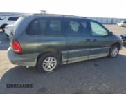 ✅ 2000 Dodge Caravan LE • VIN: 1B4GP54L7YB571056 • Lot: 71631365. Listed on Copart with 136,970 mi. Free auction sales archive from the USA and detailed vehicle history report at DreamBid. Image 3.