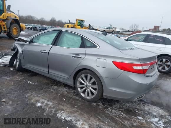 2014 Hyundai Azera Limited with VIN KMHFH4JG6EA361378, listed as a IAAI auction lot 41557210 with 58,561 mi miles and . Bid and sale history available at DreamBid. Image 3.