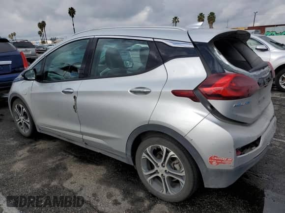 2018 Chevrolet Bolt EV Premier with VIN 1G1FX6S01J4134041, listed as a Copart auction lot 82892843 with 79,703 mi miles and . Bid and sale history available at DreamBid. Image 2.
