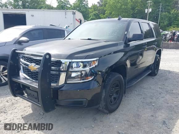 2016 Chevrolet Tahoe Commercial with VIN 1GNSKDEC9GR351872, listed as a IAAI auction lot 42239404 with 144,693 mi miles and . Bid and sale history available at DreamBid. Image 21.
