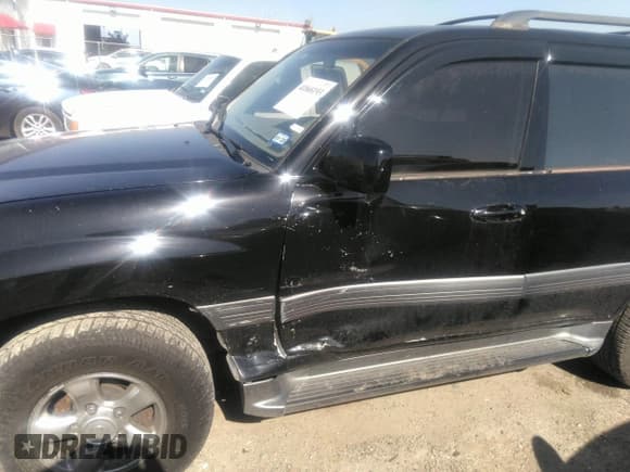 ✅ 2001 Toyota Land Cruiser • VIN: JTEHT05J512016563 • Lot: 41868193. Listed on IAAI with 247,653 mi. Free auction sales archive from the USA and detailed vehicle history report at DreamBid. Image 6.