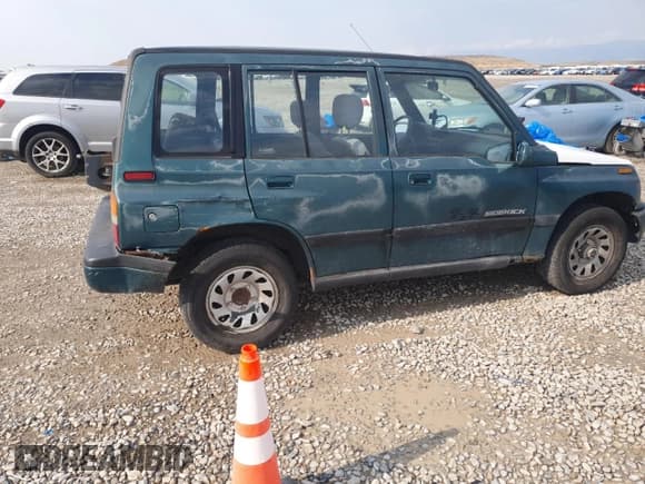 ✅ 1998 Suzuki Sidekick JX • VIN: 2S3TD03V8W6404819 • Лот: 70541335. Опубликован ранее на Copart с пробегом 174 367 миль. Бесплатный доступ к архиву аукционных продаж из США и подробный отчёт об истории автомобиля на DreamBid. Изображение 3.