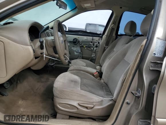✅ 2005 Ford Taurus SE • VIN: 1FAFP53U45A279204 • Lot: 89885885. Listed on Copart with 257,220 mi. Free auction sales archive from the USA and detailed vehicle history report at DreamBid. Image 7.