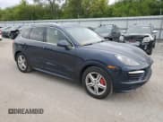 ✅ 2014 Porsche Cayenne GTS • VIN: WP1AD2A20ELA72888 • Lot: 69849105. Listed on Copart with 127,394 mi. Free auction sales archive from the USA and detailed vehicle history report at DreamBid. Image 4.
