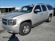 ✅ 2009 Chevrolet Suburban 2LT • VIN: 1GNFK26369J120210 • Lot: 81269375. Listed on Copart with 207,451 mi. Free auction sales archive from the USA and detailed vehicle history report at DreamBid. Image 1.
