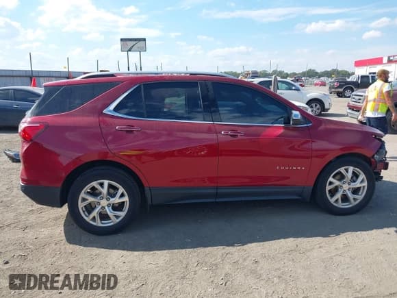 ✅ 2020 Chevrolet Equinox Premier • VIN: 3GNAXNEV4LS659477 • Лот: 43486084. Опубликован ранее на IAAI с пробегом 101 377 миль. Бесплатный доступ к архиву аукционных продаж из США и подробный отчёт об истории автомобиля на DreamBid. Изображение 14.