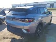 ✅ 2023 Volkswagen ID.4 S • VIN: 1V25MPE83PC030764 • Lot: 43486585. Listed on IAAI with 23,653 mi. Free auction sales archive from the USA and detailed vehicle history report at DreamBid. Image 4.