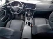 ✅ 2021 Volkswagen Jetta SEL • VIN: 3VWE57BU1MM021973 • Lot: 94962965. Listed on Copart with 168,239 mi. Free auction sales archive from the USA and detailed vehicle history report at DreamBid. Image 8.