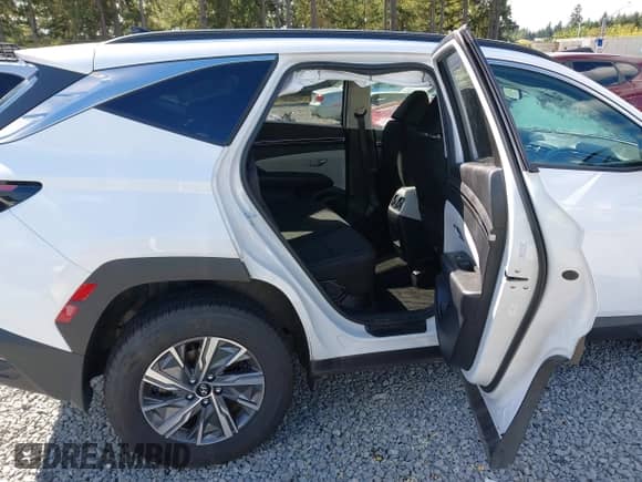 2023 Hyundai Tucson Blue z VIN KM8JBCA1XPU113640, wystawiony jako IAAI lot #42843566 z przebiegiem 56 035 mil mil oraz . Historia ofert i sprzedaży dostępna na DreamBid. Obrazek 8.