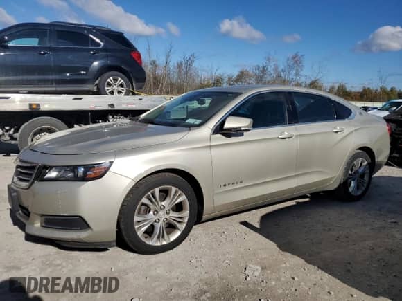 2014 Chevrolet Impala LT with VIN 2G1125S32E9300650, listed as a Copart auction lot 90485325 with 166,657 mi miles and Salvage title. Bid and sale history available at DreamBid. Image 1.