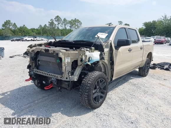 2022 Chevrolet Silverado 1500 Custom Trail Boss with VIN 3GCPDCED1NG639300, listed as a IAAI auction lot 42308253 with 13,799 mi miles and . Bid and sale history available at DreamBid. Image 2.