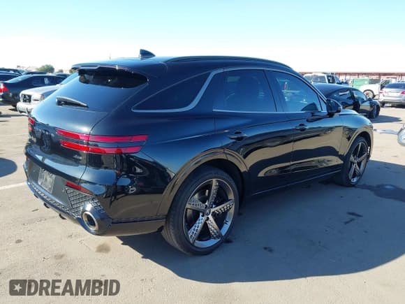 ✅ 2023 Genesis GV70 2.5T • VIN: KMUMADTB5PU101635 • Lot: 43645774. Listed on IAAI with 34,790 mi. Free auction sales archive from the USA and detailed vehicle history report at DreamBid. Image 4.