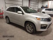 ✅ 2012 Kia Sorento SX • VIN: 5XYKWDA25CG285307 • Лот: 43116669. Опубликован ранее на IAAI с пробегом 147 130 миль. Бесплатный доступ к архиву аукционных продаж из США и подробный отчёт об истории автомобиля на DreamBid. Изображение 1.