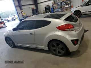 2014 Hyundai Veloster Turbo z VIN KMHTC6AE2EU208474, wystawiony jako Copart lot #65442584 z przebiegiem 57 596 mil mil oraz Szkoda całkowita • Salvage title. Historia ofert i sprzedaży dostępna na DreamBid. Obrazek 2.