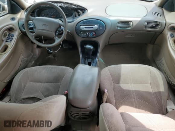 ✅ 1998 Ford Taurus LX • VIN: 1FAFP52S7WG271015 • Lot: 71518855. Listed on Copart with 136,411 mi. Free auction sales archive from the USA and detailed vehicle history report at DreamBid. Image 8.