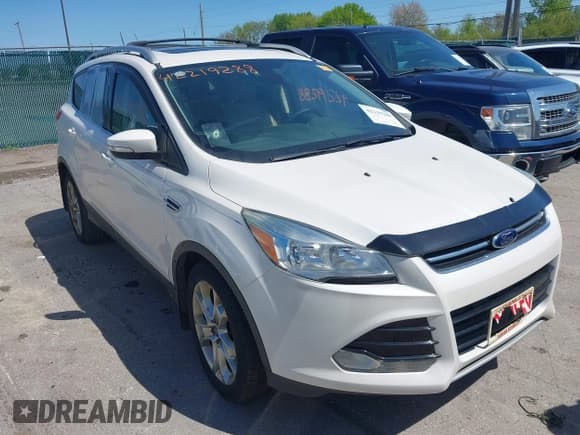 ✅ 2015 Ford Escape Titanium • VIN: 1FMCU0J91FUA50191 • Lot: 42219288. Listed on IAAI with 159,886 mi. Free auction sales archive from the USA and detailed vehicle history report at DreamBid. Image 1.